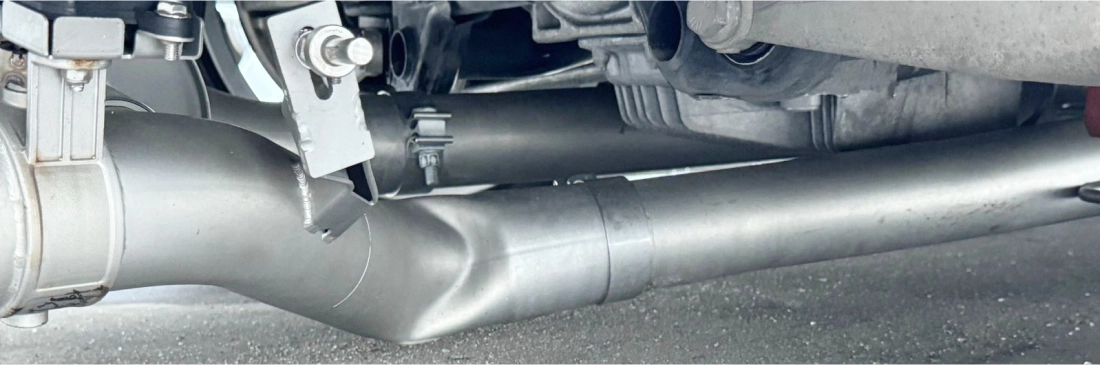 picture of a damaged exhaust pipe